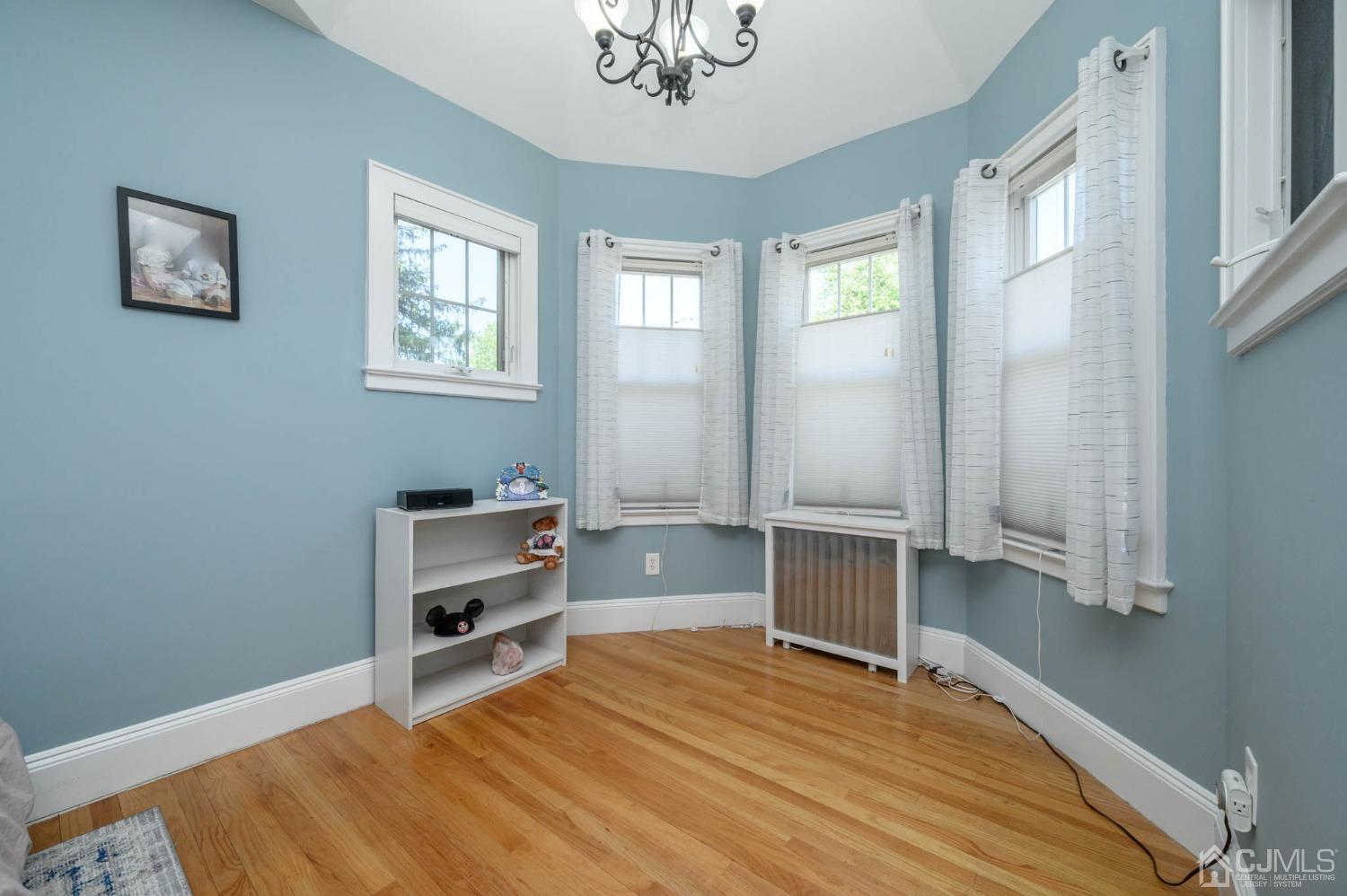 1221 Beech Avenue Mountainside, NJ 07092 - Photo 28 of 46 a room with a bed and a window