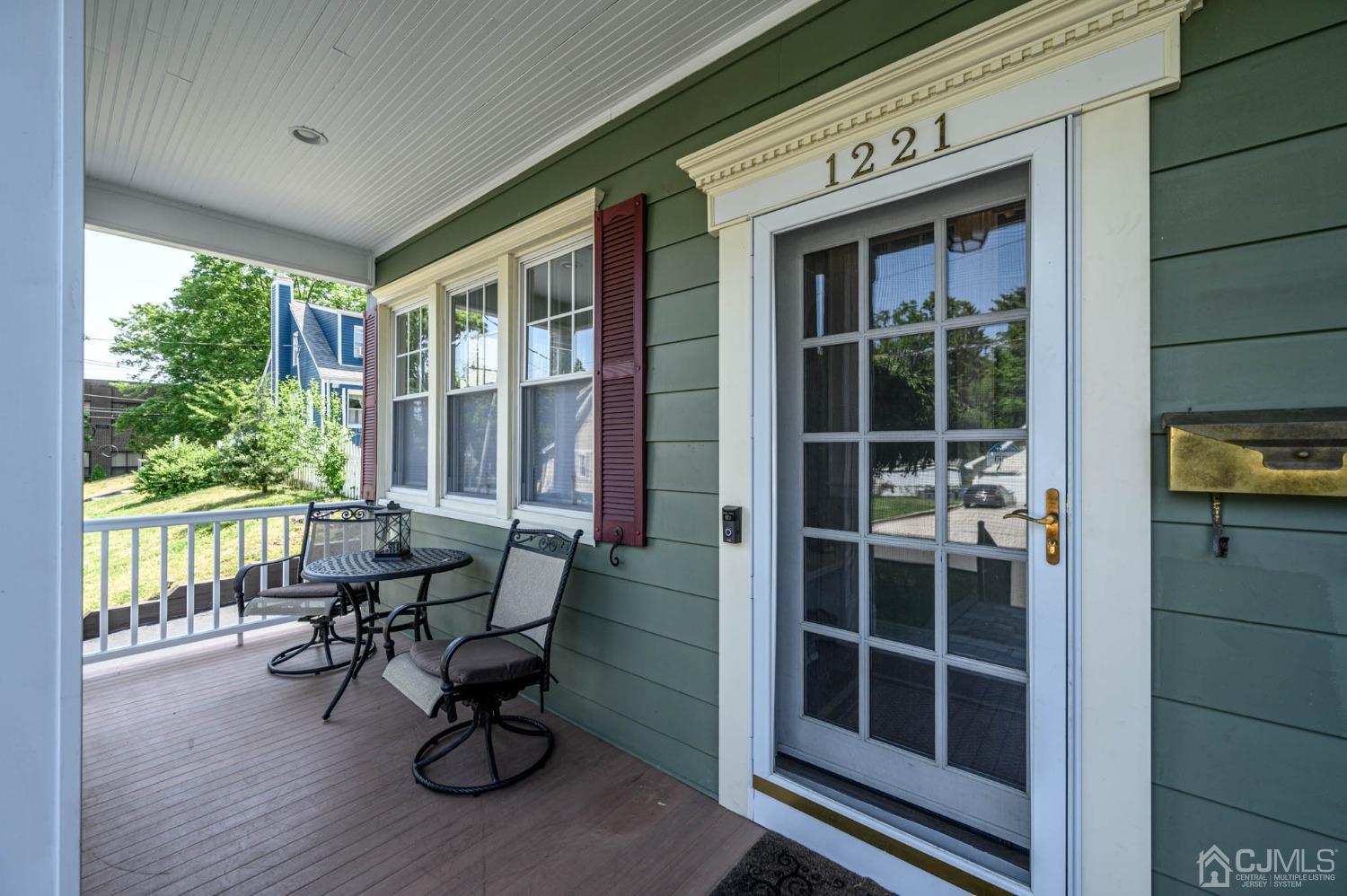 1221 Beech Avenue Mountainside, NJ 07092 - Photo 3 of 46 a view of a door with a chairs and table in a patio