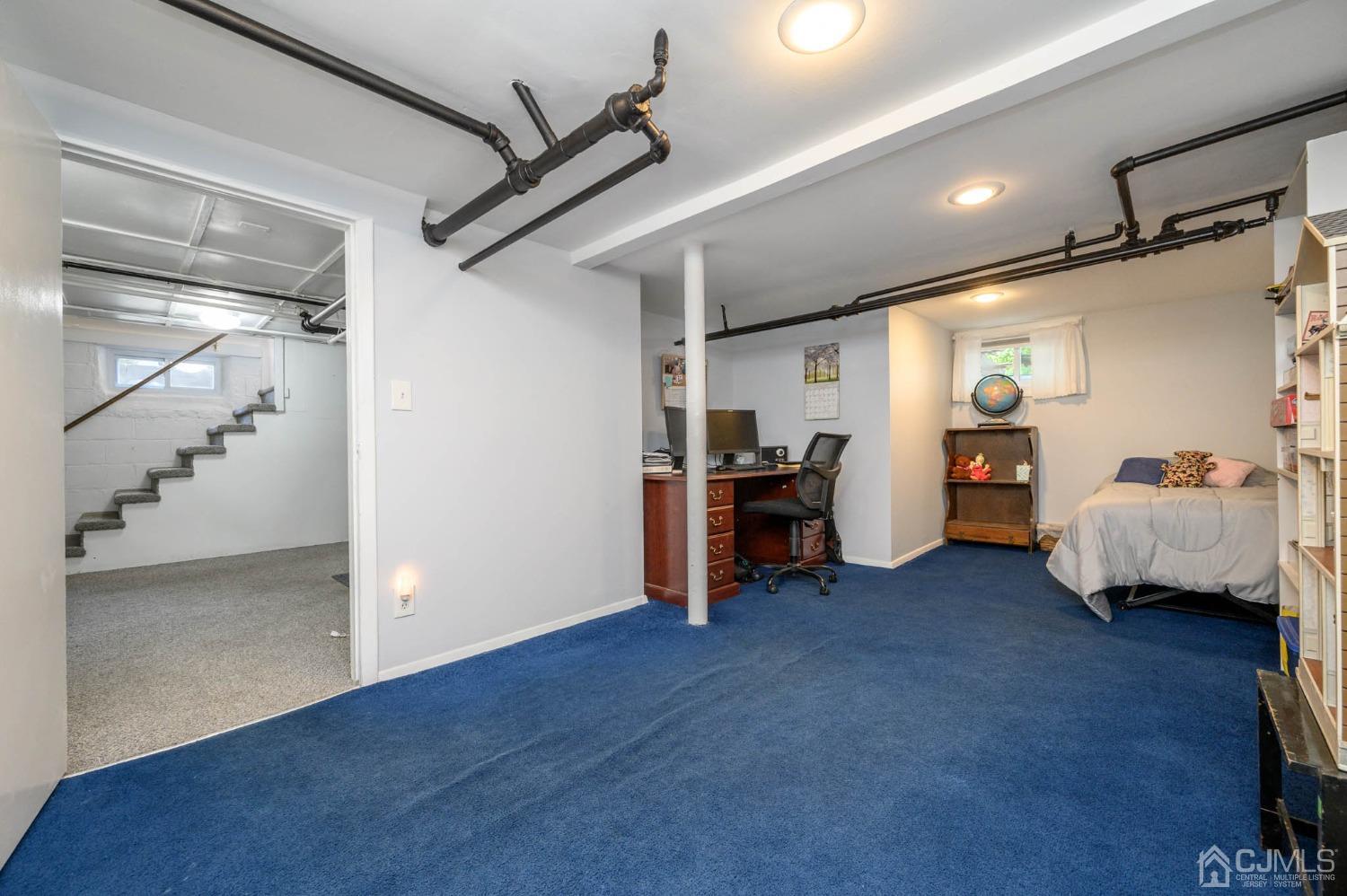 1221 Beech Avenue Mountainside, NJ 07092 - Photo 36 of 46 a view of a livingroom with furniture and a garage