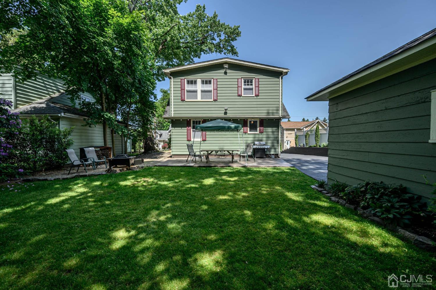 1221 Beech Avenue Mountainside, NJ 07092 - Photo 38 of 46 a view of a house with a backyard