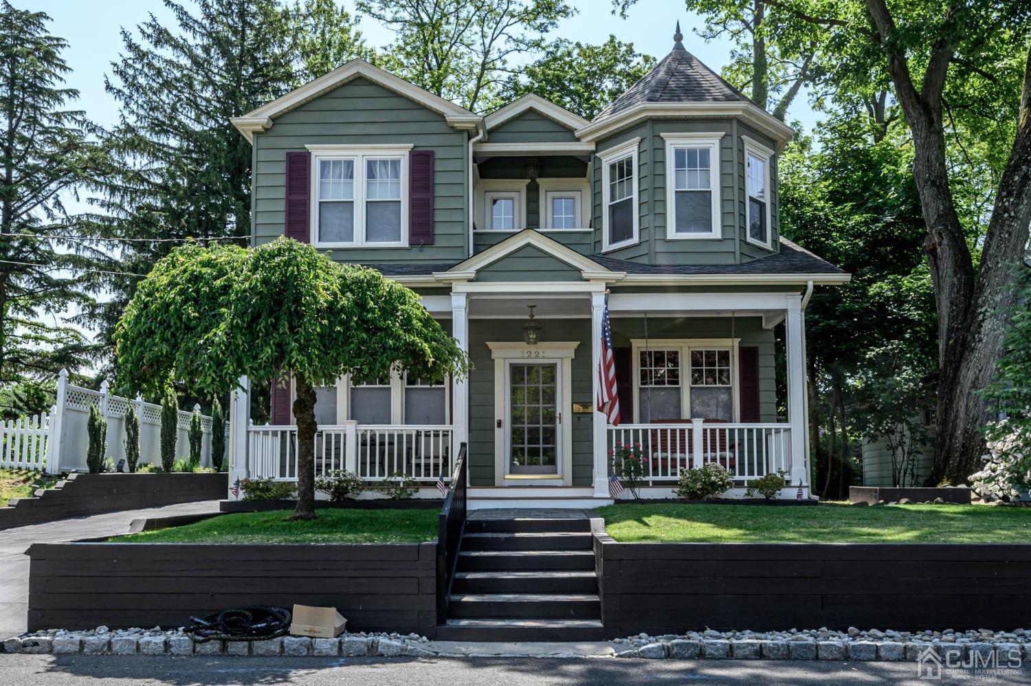 1221 Beech Avenue Mountainside, NJ 07092 - Photo 45 of 46 a front view of a house with a yard