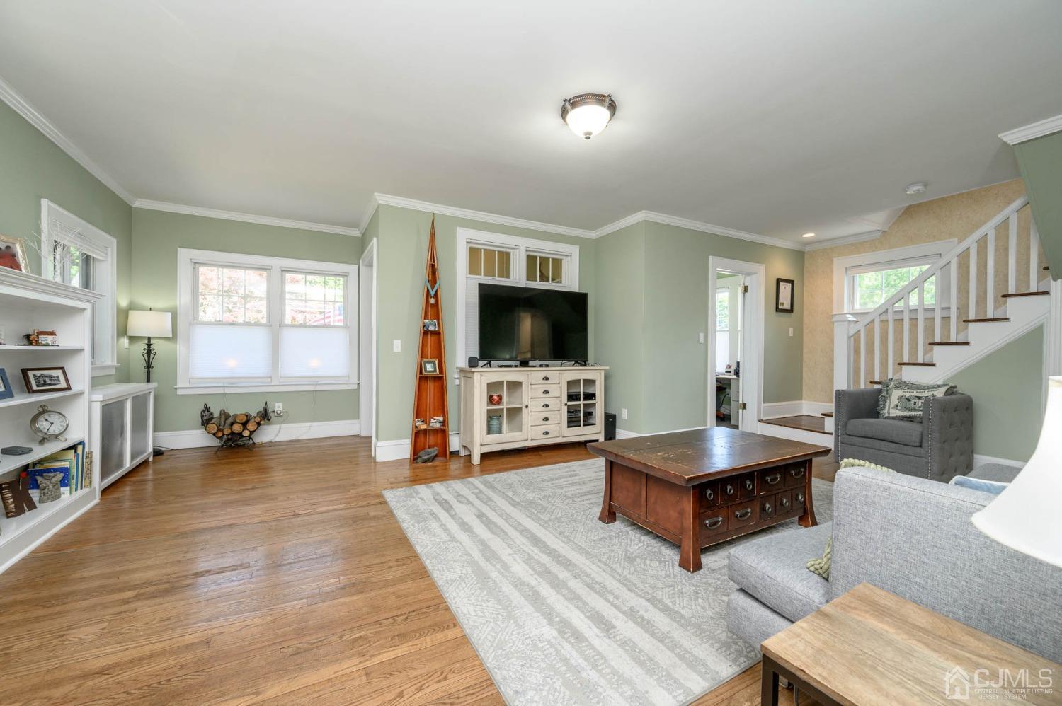 1221 Beech Avenue Mountainside, NJ 07092 - Photo 7 of 46 a living room with furniture and a flat screen tv