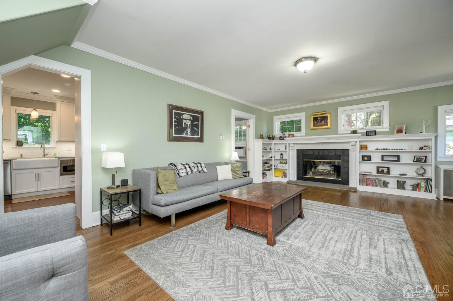 1221 Beech Avenue Mountainside, NJ 07092 - Photo 8 of 46 a living room with furniture and a fireplace