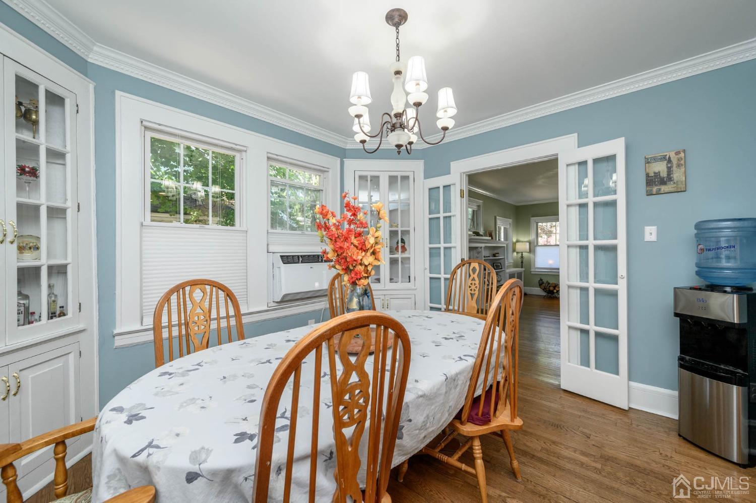 1221 Beech Avenue Mountainside, NJ 07092 - Photo 9 of 46 a view of a dining room with furniture window and wooden floor
