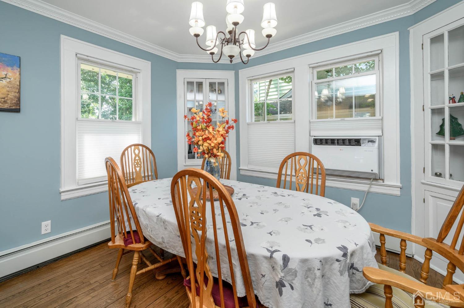 1221 Beech Avenue Mountainside, NJ 07092 - Photo 10 of 46 a view of a dining room with furniture and chandelier