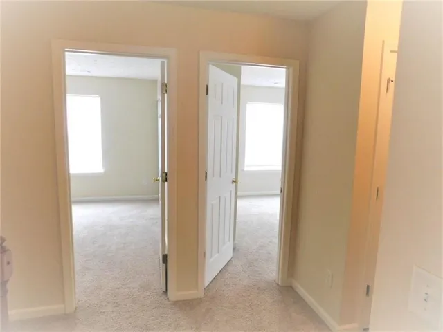 a view of a room with a wardrobe space