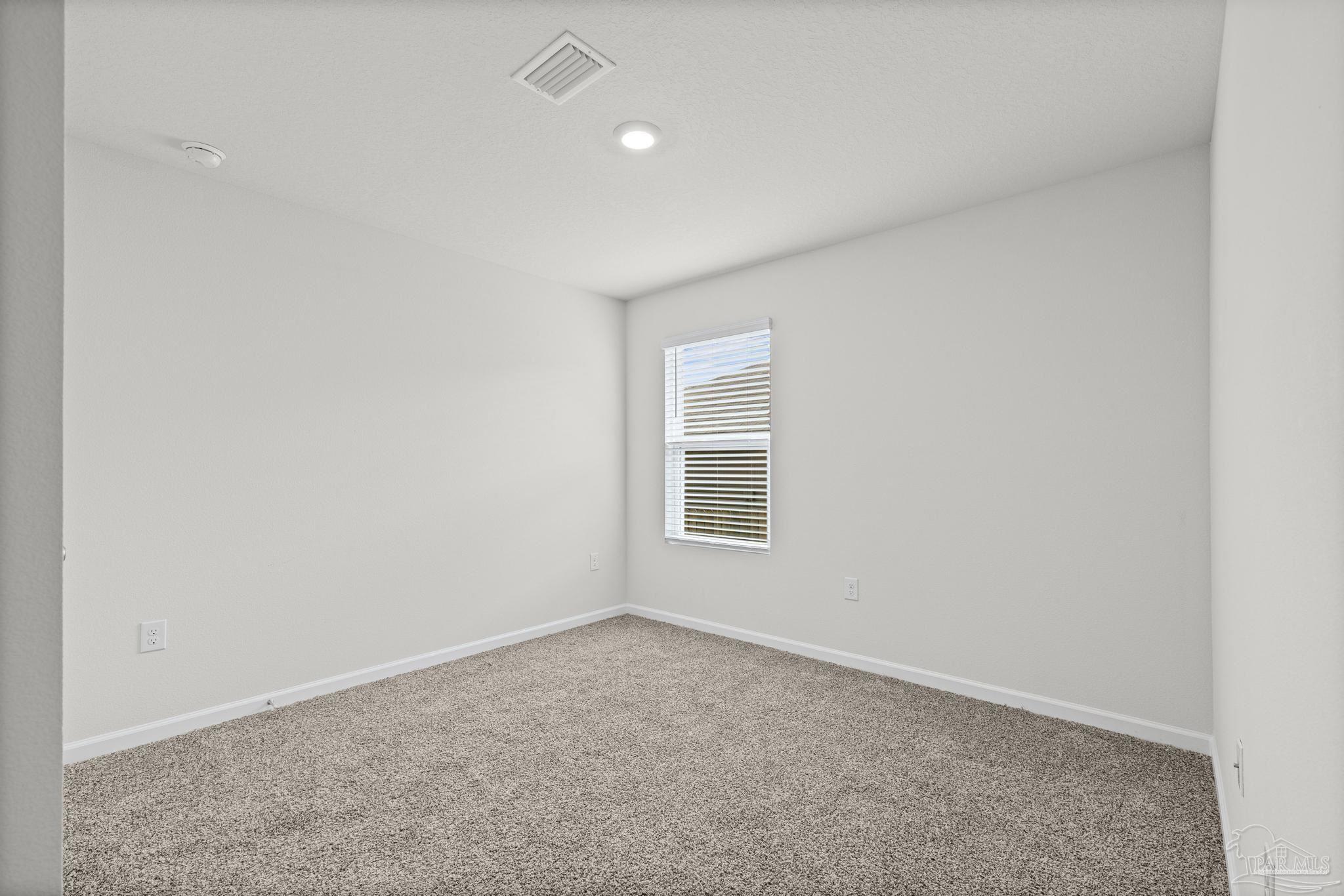 5771 Belmont Stakes Road Pensacola, FL 32526 - Photo 21 of 36 an empty room with a window