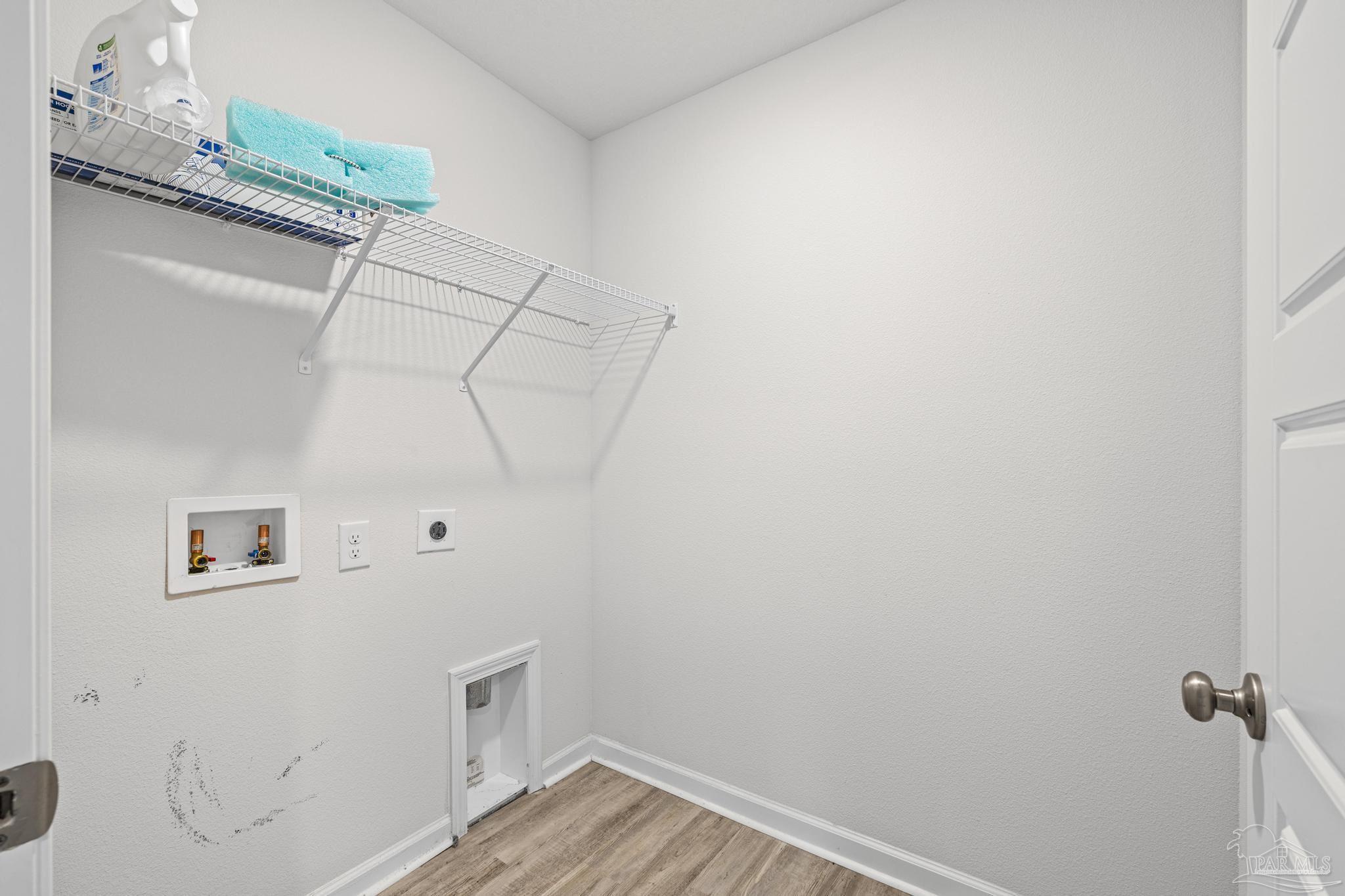 5771 Belmont Stakes Road Pensacola, FL 32526 - Photo 26 of 36 a view of a hallway with closet