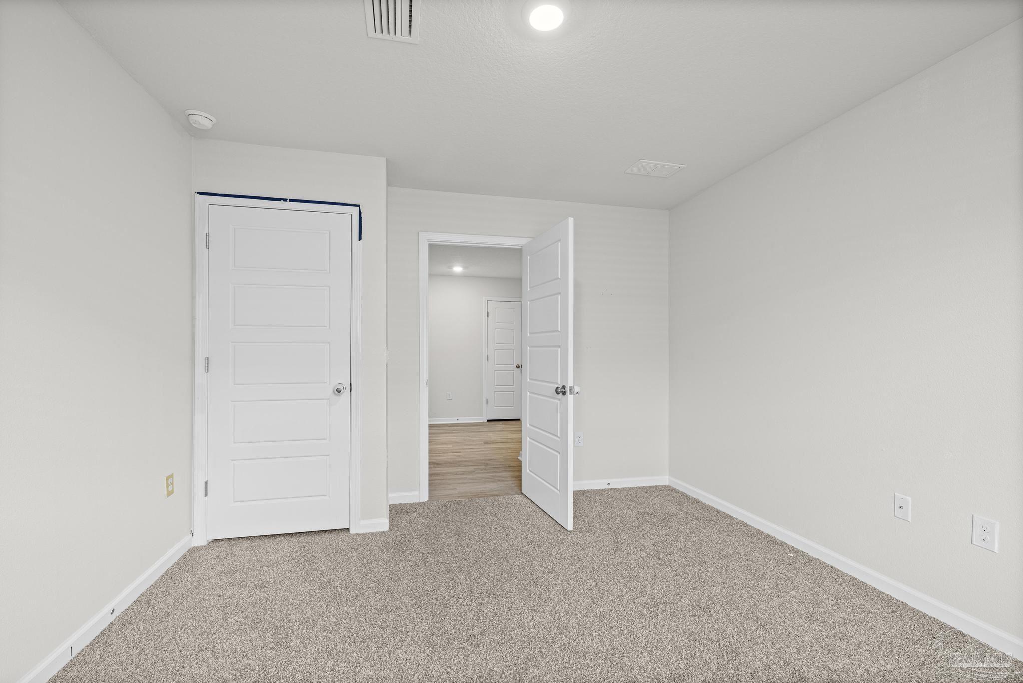 5771 Belmont Stakes Road Pensacola, FL 32526 - Photo 27 of 36 a view of an empty room