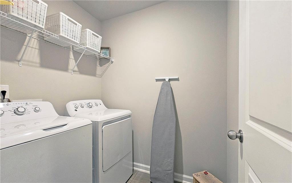 3401 Endurance Court, Unit 10 Atlanta, GA 30349 - Photo 16 of 17 a utility room with dryer and washer