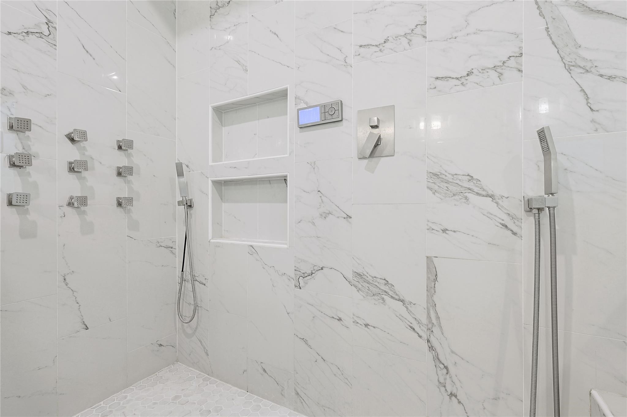 642 Parthenon Place New Caney, TX 77357 - Photo 13 of 30 a bathroom with a shower