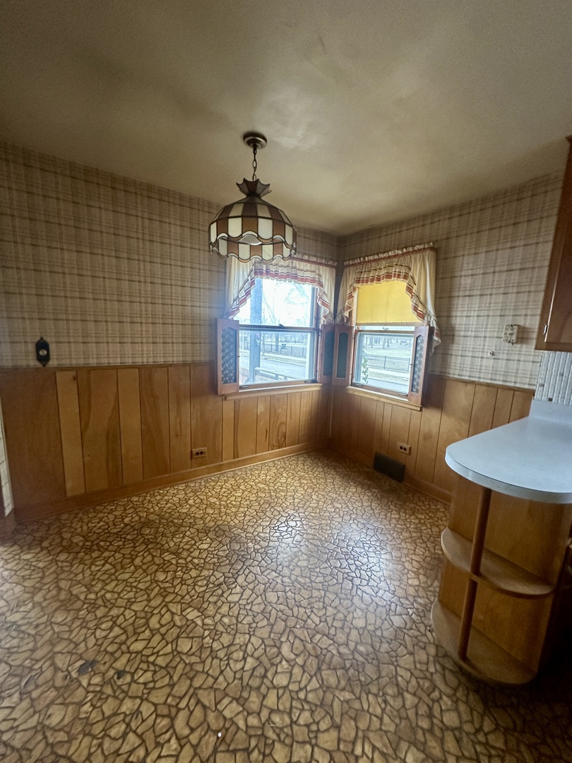 7000 West Henderson Street Chicago, IL 60634 - Photo 12 of 30 wooden floor in an empty room