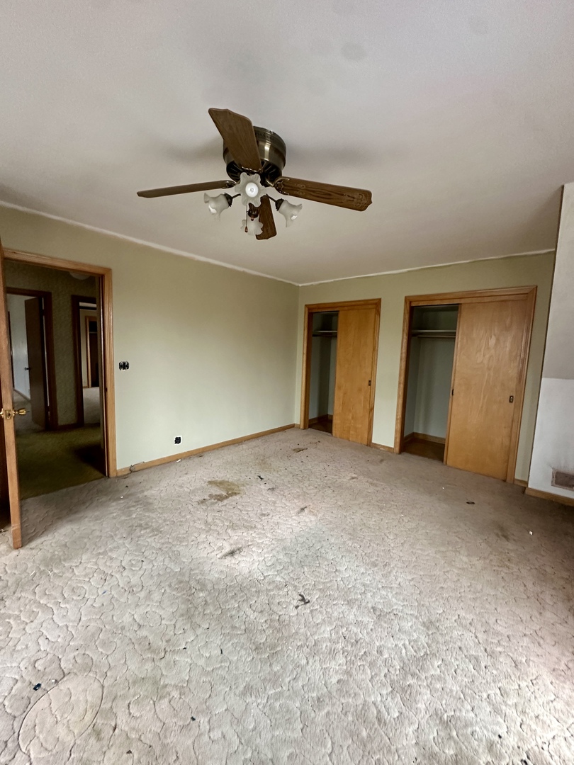 7000 West Henderson Street Chicago, IL 60634 - Photo 20 of 30 a view of a livingroom with a staircase