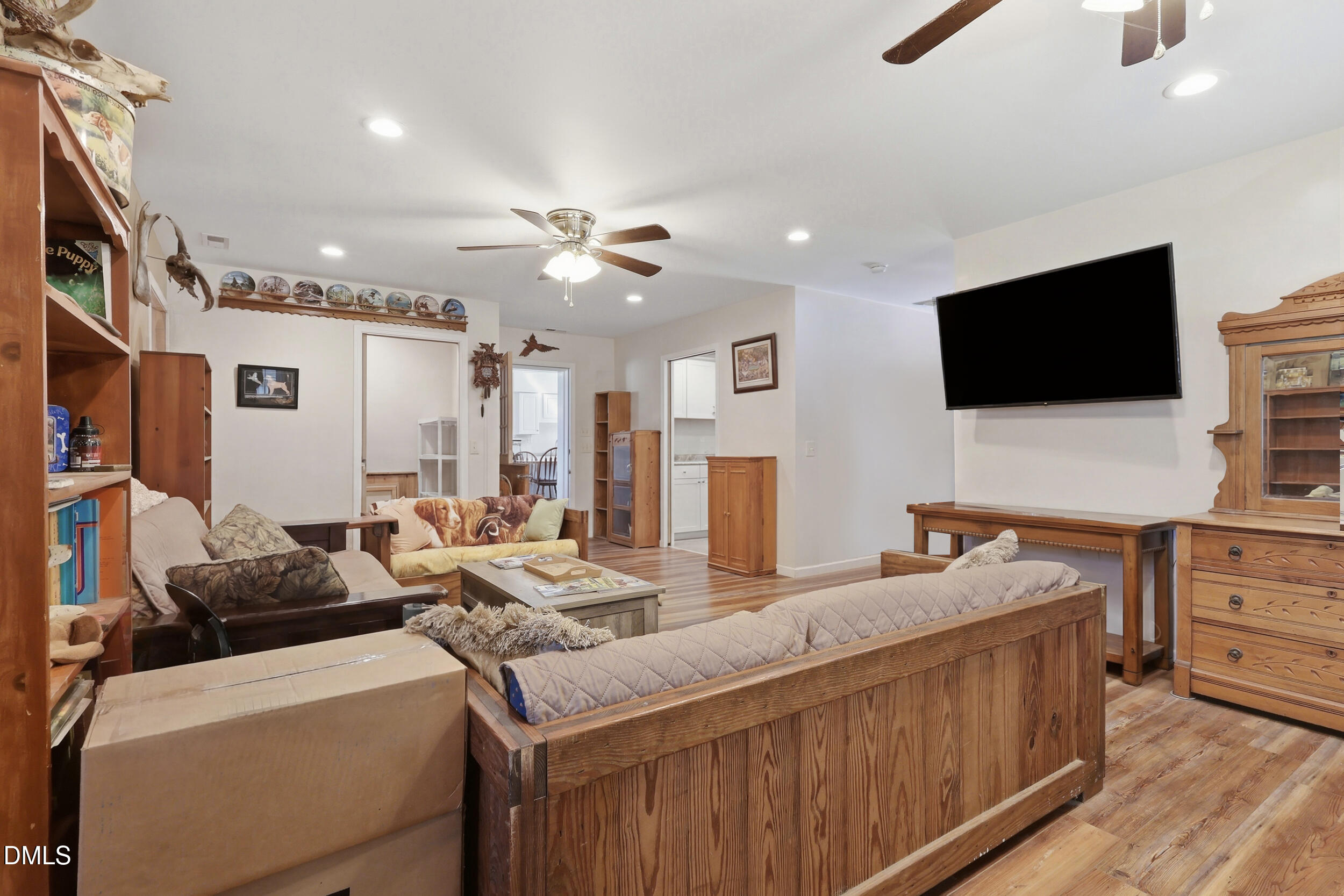 2631 South Jim Minor Road Haw River, NC 27258 - Photo 4 of 62 a living room with furniture and a flat screen tv
