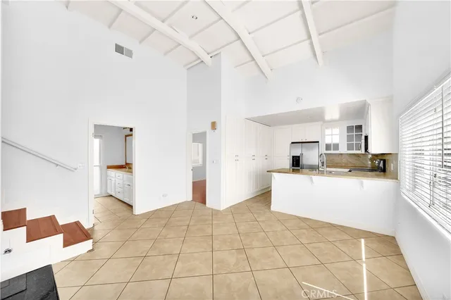a kitchen with stainless steel appliances cabinets and a counter top space