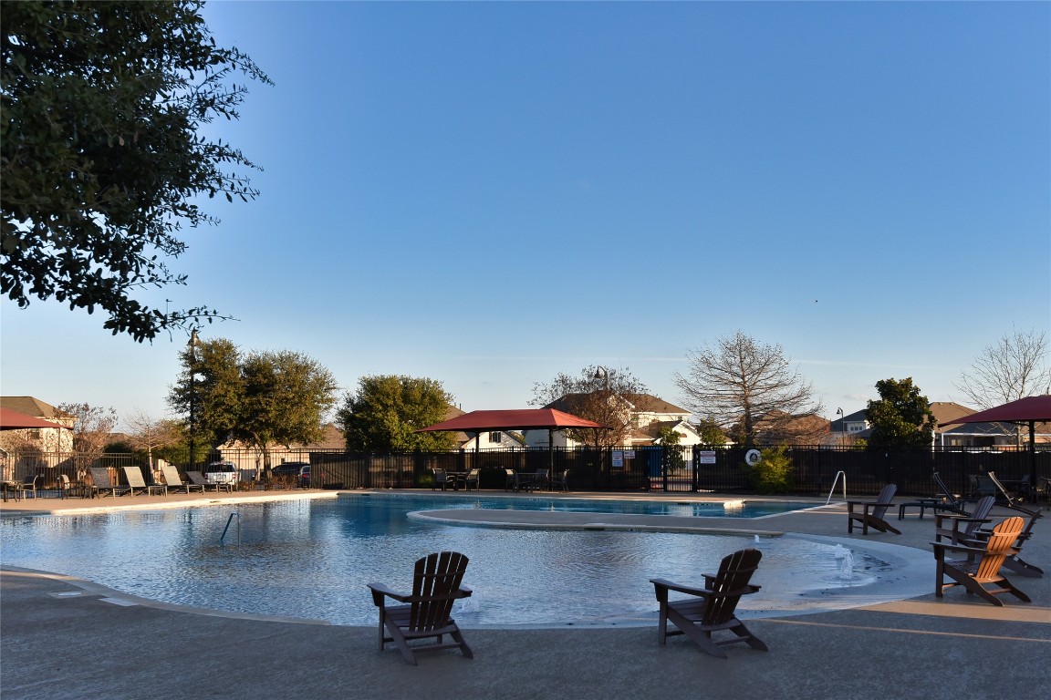 5008 Risana Bend Round Rock, TX 78665 - Photo 20 of 21 a view of swimming pool with outdoor seating and city view