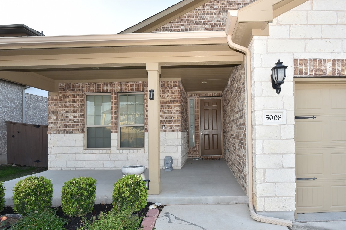 5008 Risana Bend Round Rock, TX 78665 - Photo 2 of 21 a view of entrance front of building