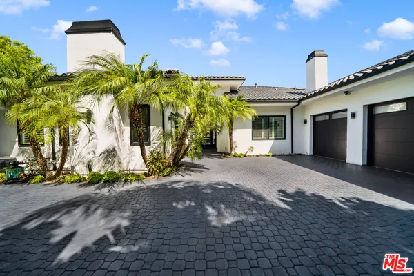a view of a house with a patio