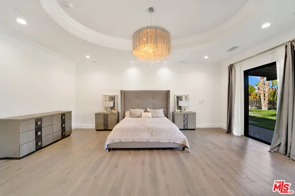 a bed room with a bed and a window