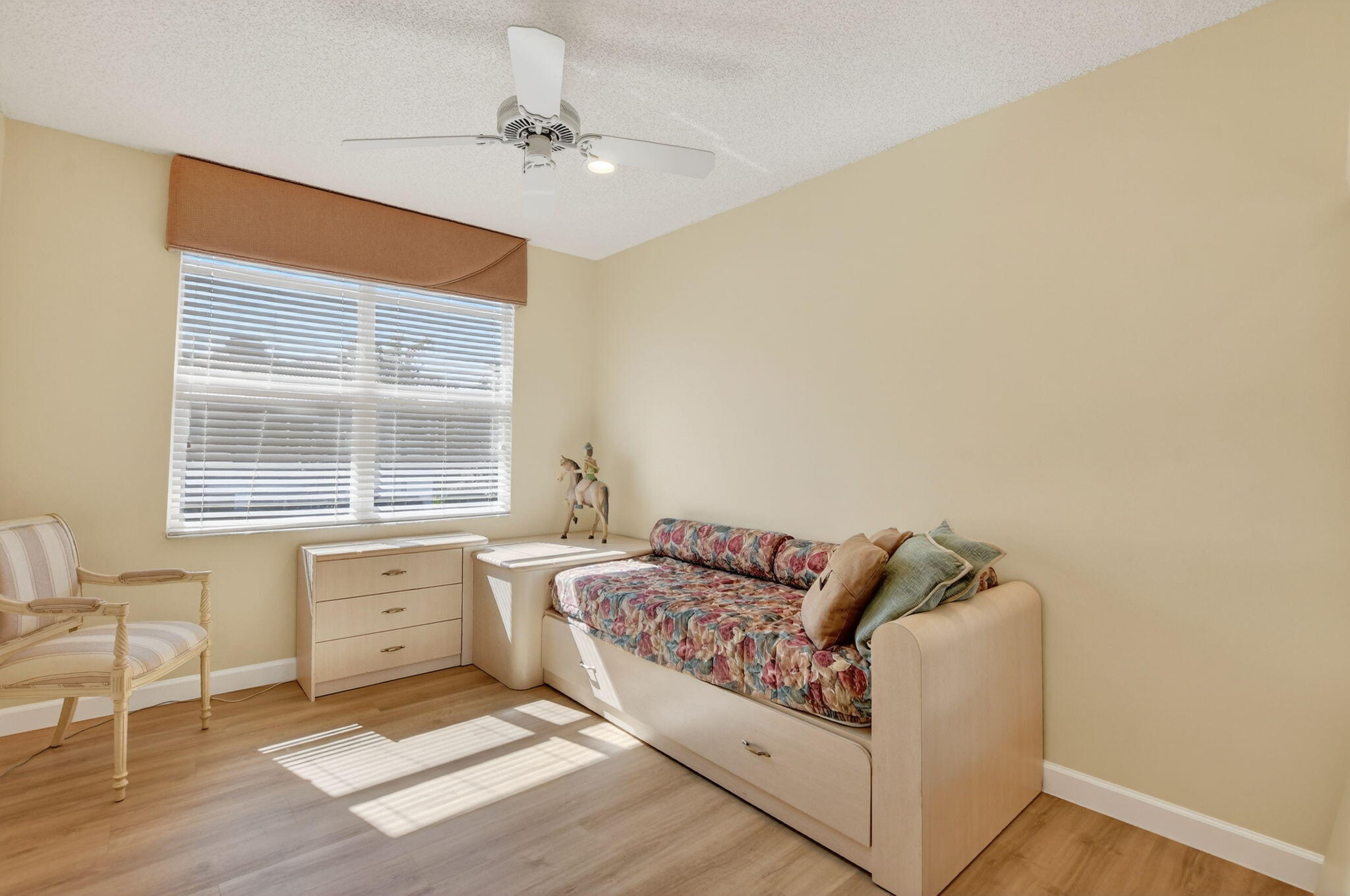 20220 Boca W Drive, Unit 702 Boca Raton, FL 33434 - Photo 24 of 51 a living room with furniture and a window