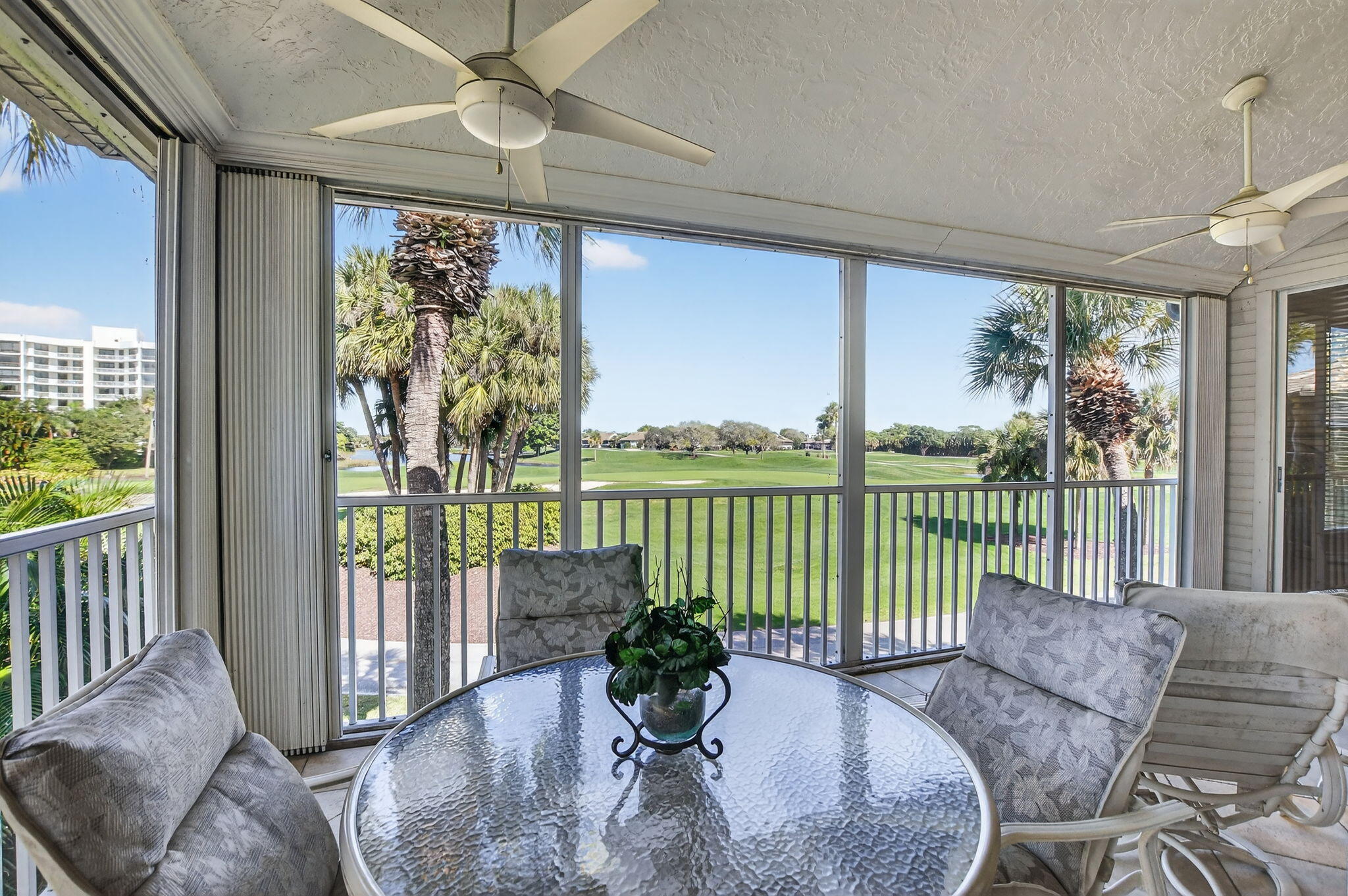 20220 Boca W Drive, Unit 702 Boca Raton, FL 33434 - Photo 28 of 51 a view of a porch with furniture