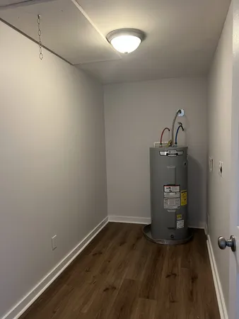 a view of storage and utility room with a sink
