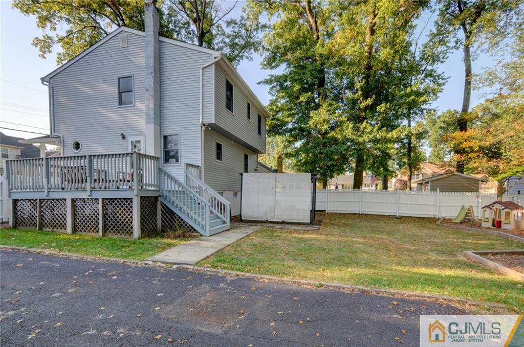 194 East Cliff Road Colonia, NJ 07067 - Photo 21 of 22 a front view of house with yard and trees