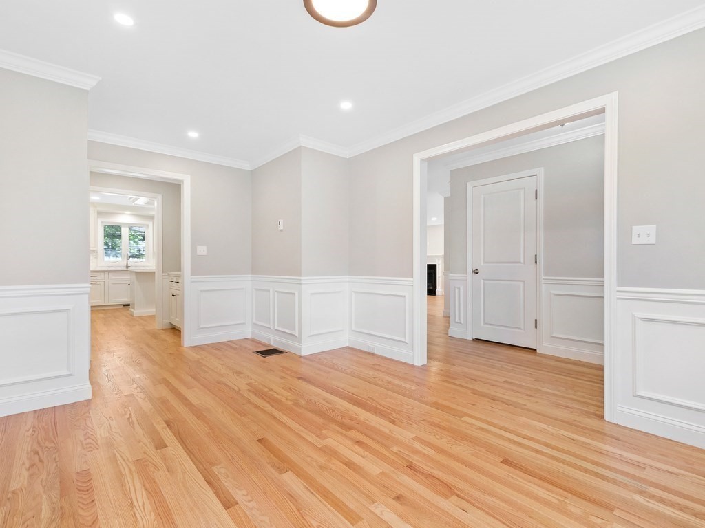 125 Thornton Road Waltham, MA 02453 - Photo 20 of 42 wooden floor in an empty room with a window