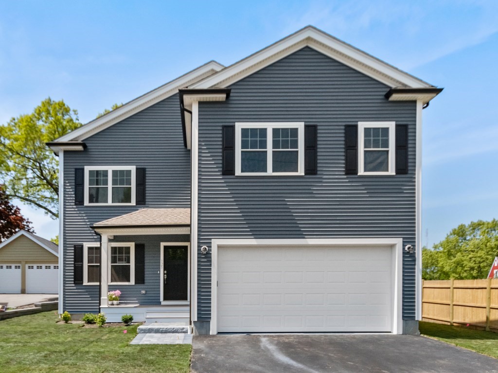 125 Thornton Road Waltham, MA 02453 - Photo 2 of 42 a view of a house with yard and plants