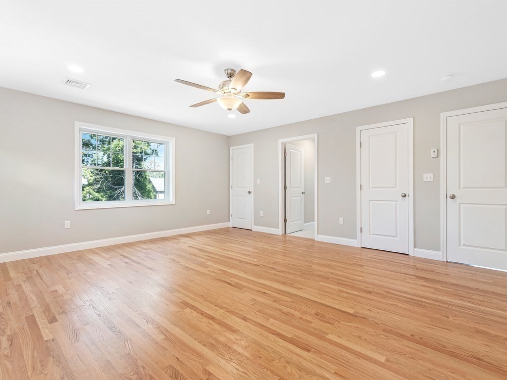 125 Thornton Road Waltham, MA 02453 - Photo 26 of 42 wooden floor in an empty room with a window