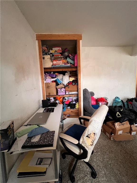 423 Spring Avenue Ellwood City, PA 16117 - Photo 15 of 20 a room with furniture and a book shelf