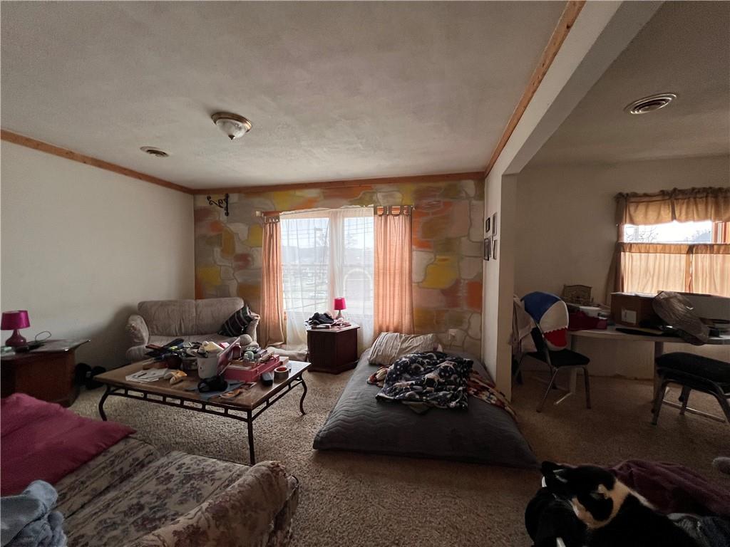 423 Spring Avenue Ellwood City, PA 16117 - Photo 18 of 20 a living room with furniture and a large window