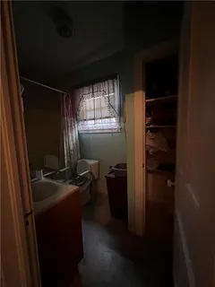 a kitchen with a stove and a refrigerator