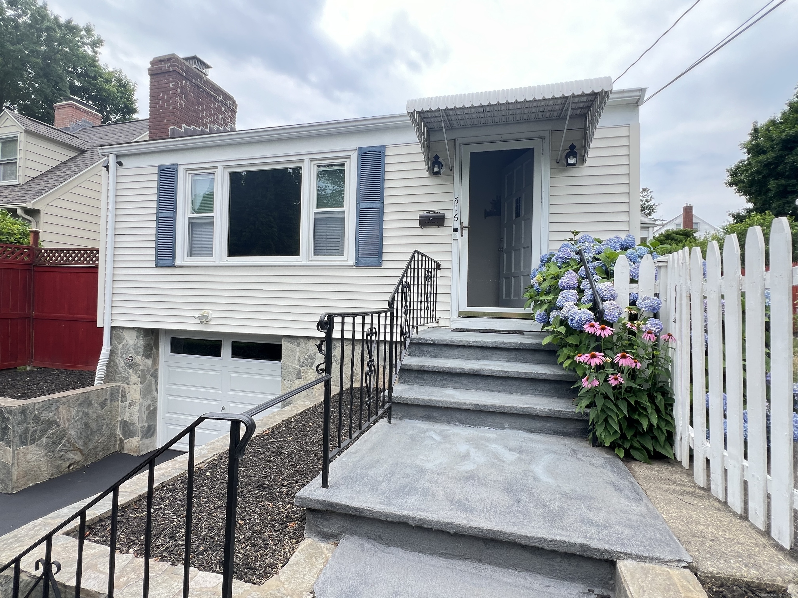 516 Old Stratfield Road Fairfield, CT 06825 - Photo 1 of 1 a view of a house with deck and wooden floor