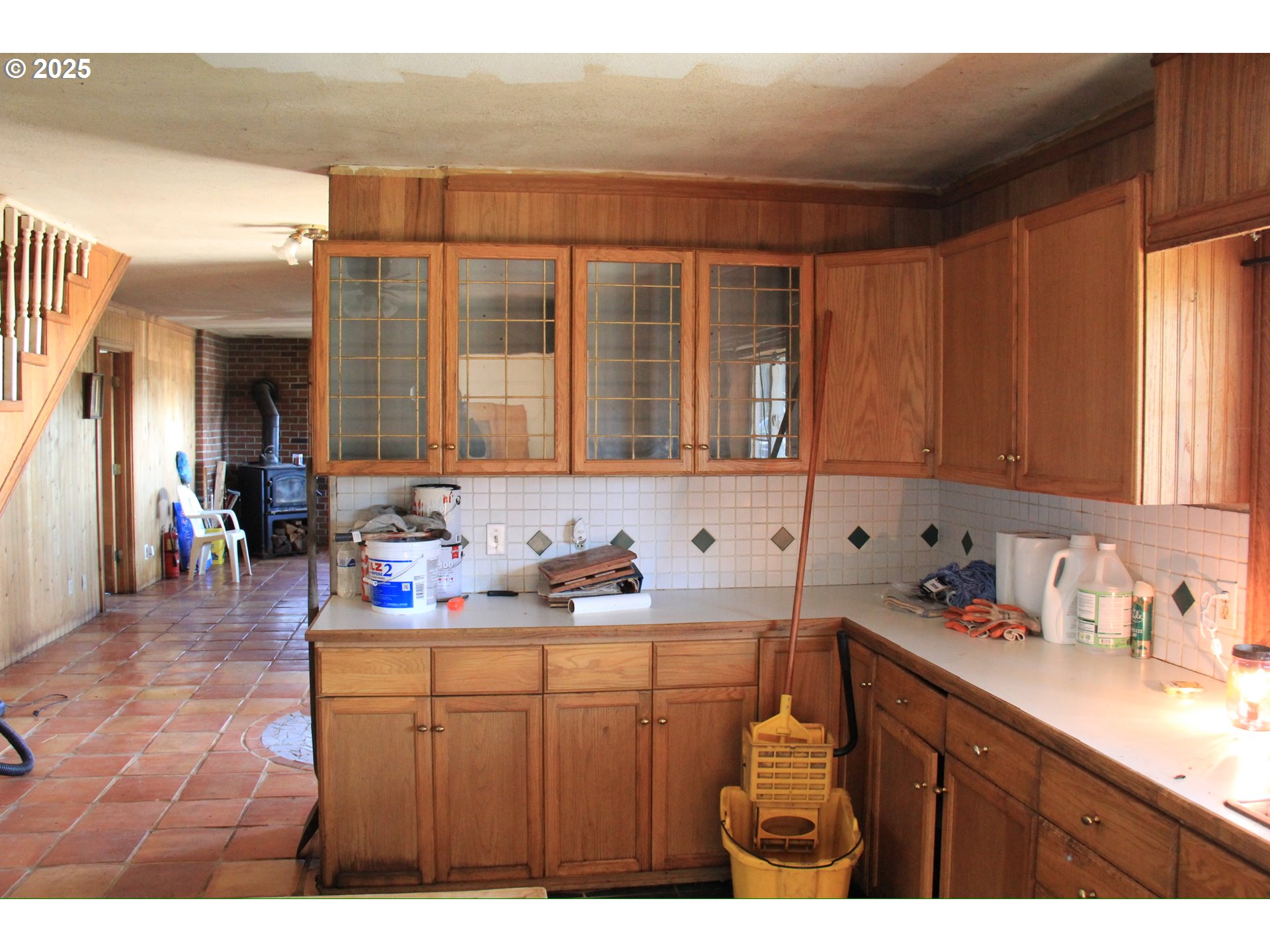 12051 South Riggs Damm Road Canby, OR 97013 - Photo 11 of 27 a kitchen with a sink cabinets and window