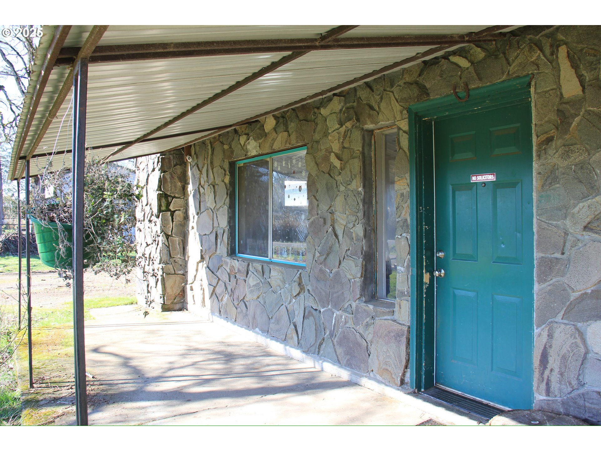 12051 South Riggs Damm Road Canby, OR 97013 - Photo 20 of 27 a view of a entrance door of the house