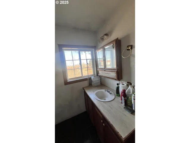 a picture of a room with a floor to ceiling window