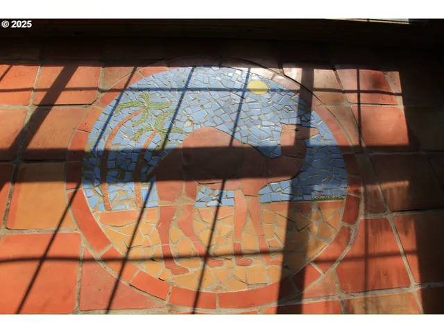 a kitchen with a sink cabinets and window