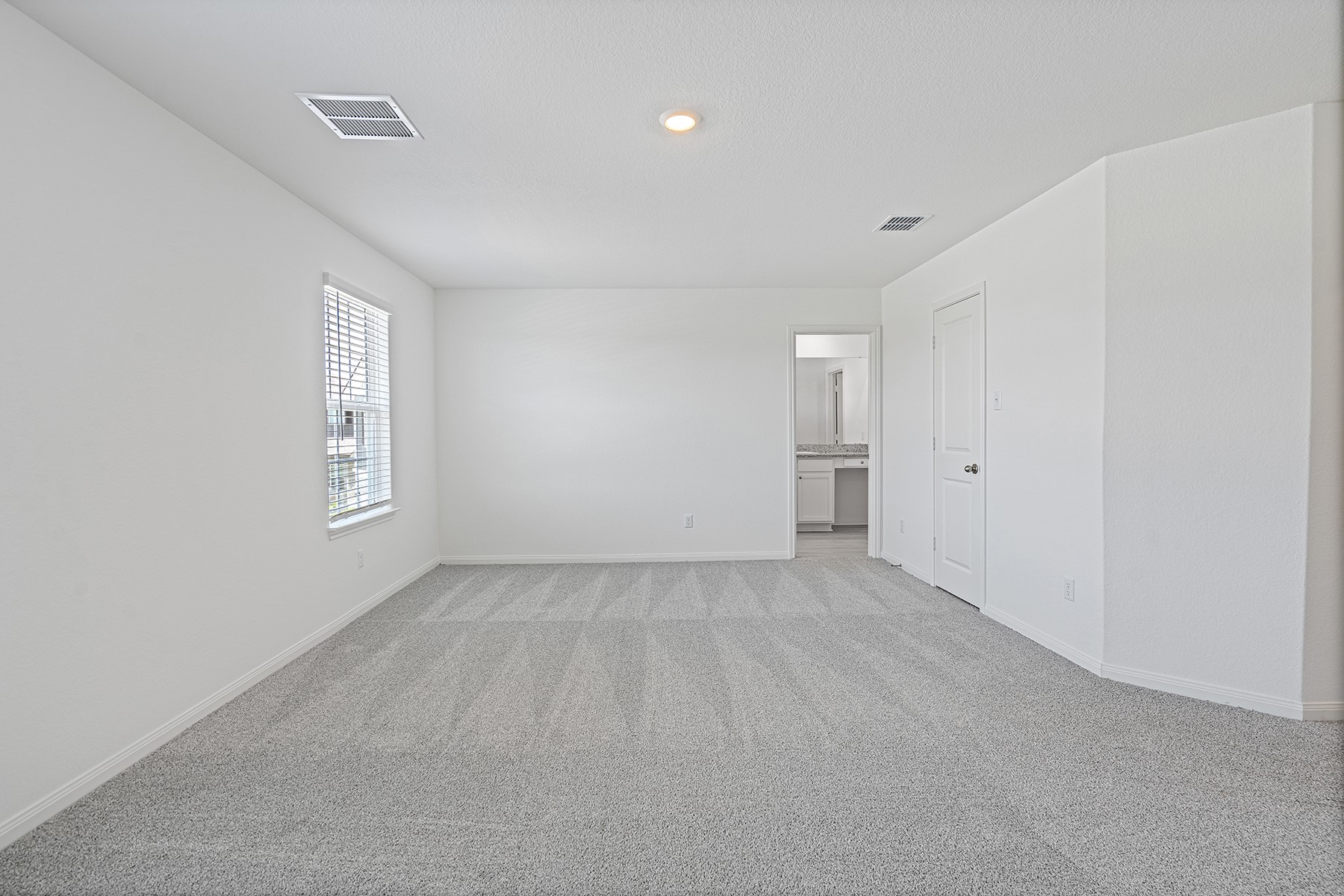 14620 Wahlbergs Way Elgin, TX 78621 - Photo 6 of 12 wooden floor in an empty room with a window