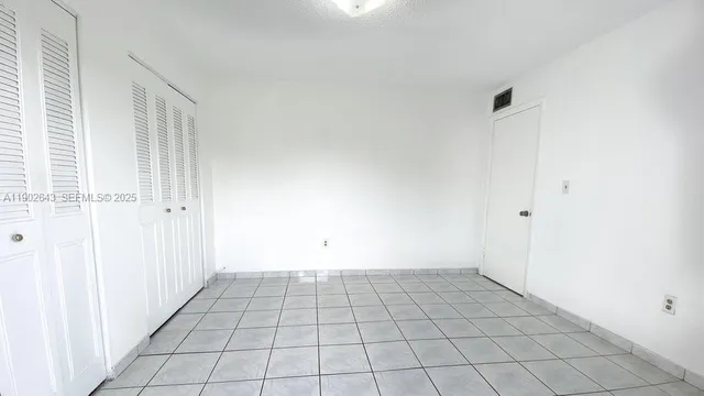 a view of a house with a swimming pool