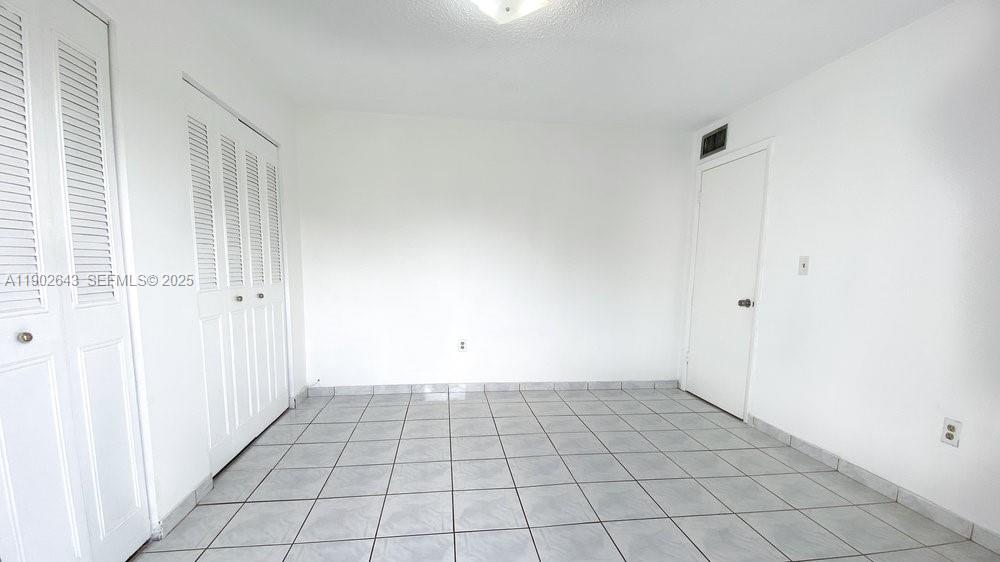 2496 Southwest 17th Avenue, Unit 5308 Miami, FL 33145 - Photo 15 of 19 a view of an empty room