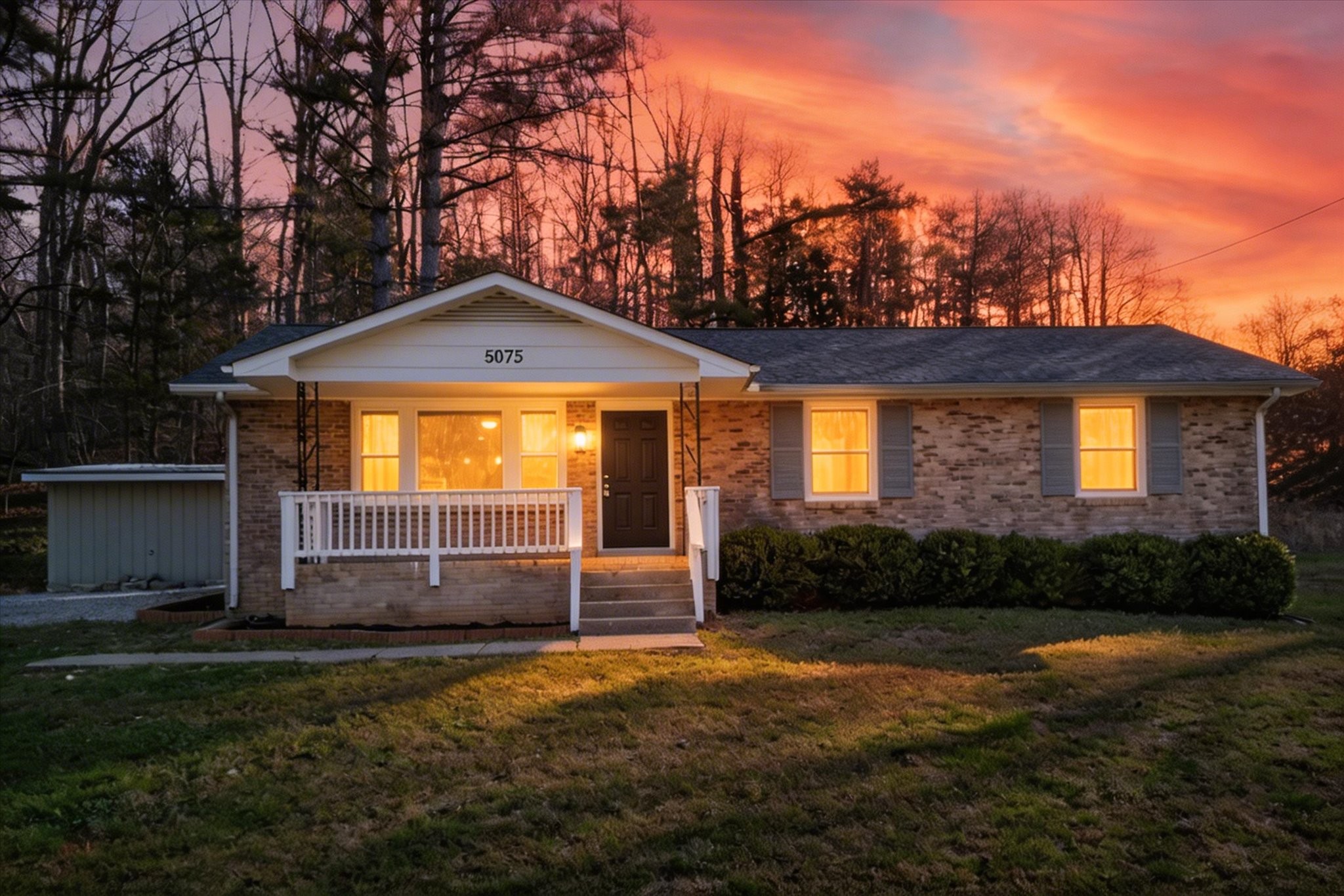 5075 Logan Road Cunningham, TN 37052 - Photo 2 of 22 a front view of a house with a yard