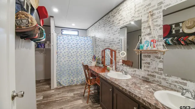a dining room with a table and chairs