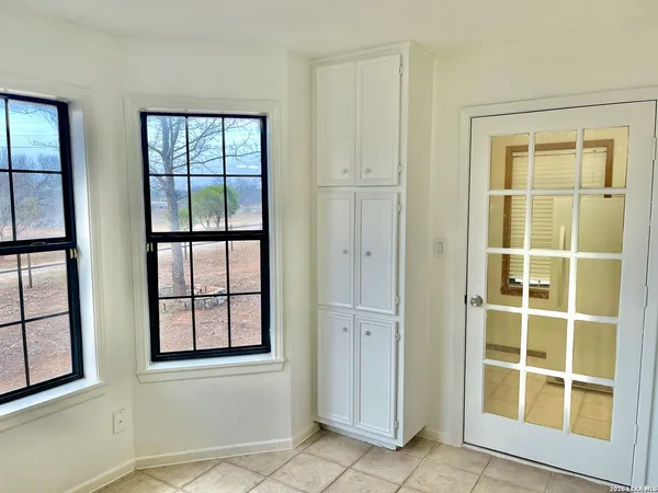 an empty room with windows