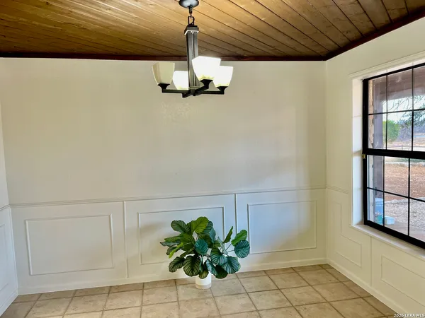 a view of a livingroom with a potted plant