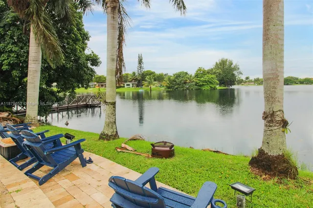 a view of a lake with a garden
