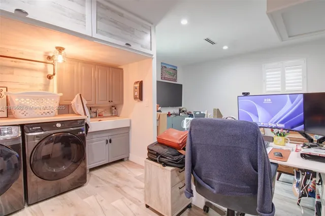 a room with furniture a rug and a window