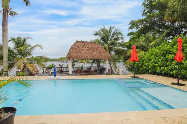 a terrace with outdoor seating and city view