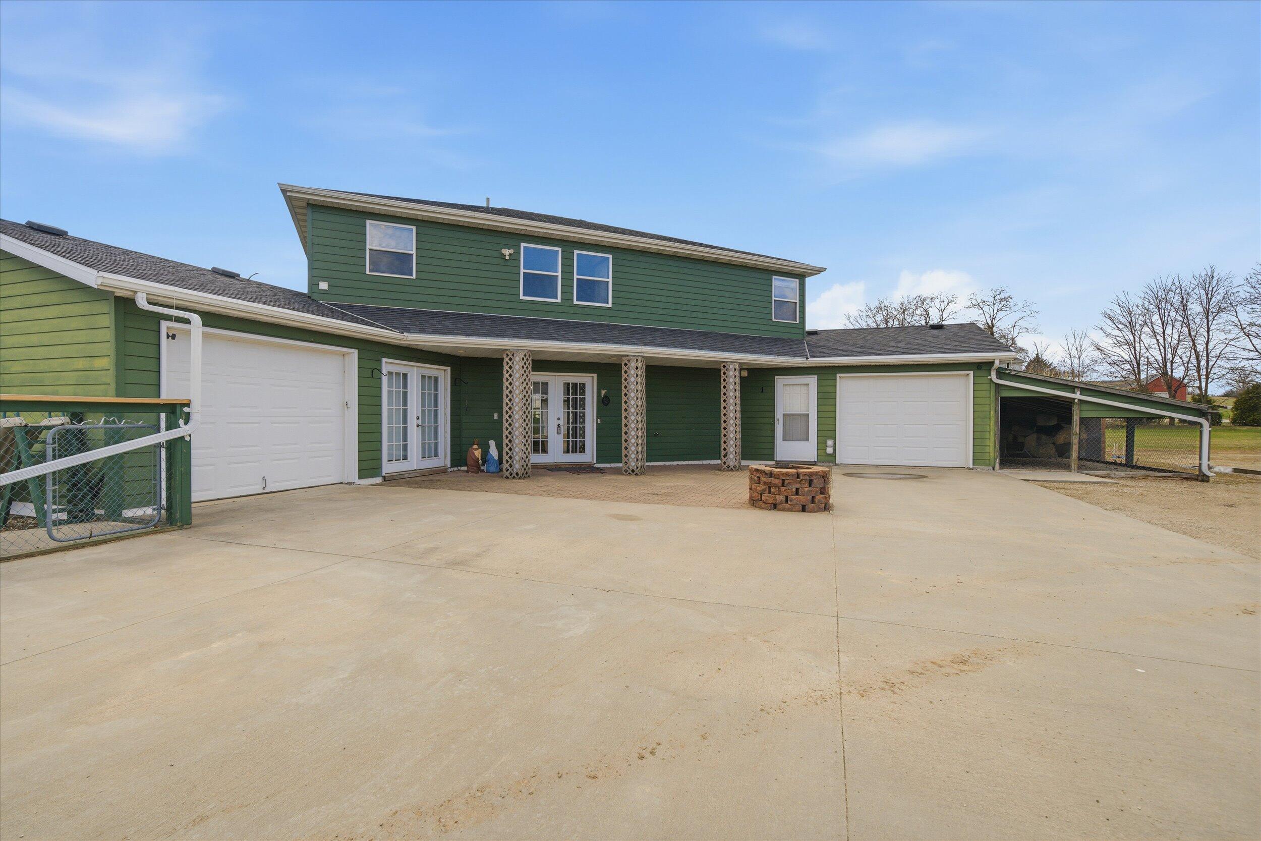 1679 Old Bridge Road Auburn, WI 53010 - Photo 2 of 52 back of house with patio