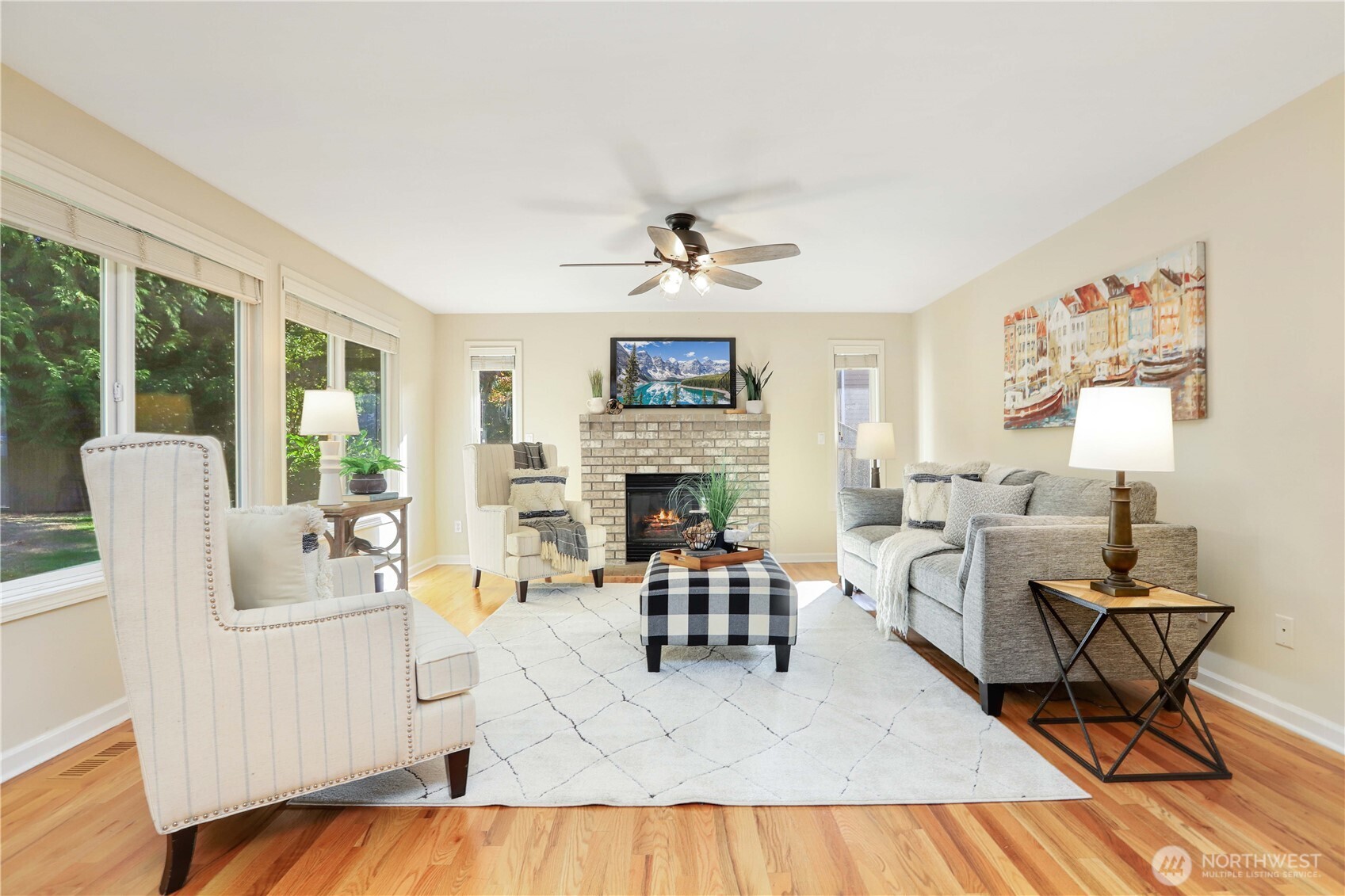 6405 154th Street Southeast Snohomish, WA 98296 - Photo 13 of 39 a living room with furniture and a fireplace